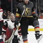 Vegas Golden Knights right wing Alex Tuch celebrates after scoring against Arizona Coyotes goaltender Antti Raanta during the second period of an NHL hockey game, Wednesday, March 28, 2018, in Las Vegas. (AP Photo/John Locher)