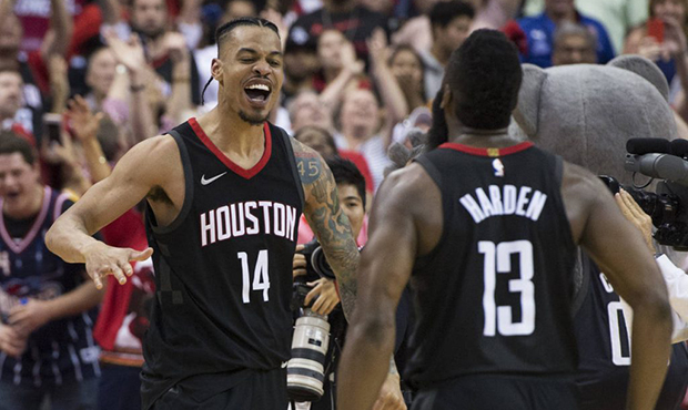 Houston Rockets guard Gerald Green (14) celebrates with James Harden (13) after hitting a shot at t...