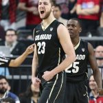 Colorado's Lucas Siewert (23) reacts after sinking a 3-point shot during the first half of an NCAA college basketball game against Arizona in the quarterfinals of the Pac-12 men's tournament Thursday, March 8, 2018, in Las Vegas. (AP Photo/Isaac Brekken)