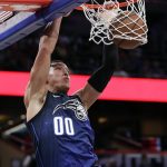 Orlando Magic's Aaron Gordon makes an uncontested dunk against the Phoenix Suns during the first half of an NBA basketball game Saturday, March 24, 2018, in Orlando, Fla. (AP Photo/John Raoux)