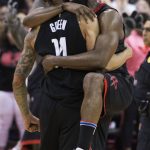 Houston Rockets guard James Harden, right, celebrates with Gerald Green after Green hit a shot at the buzzer to beat the Phoenix Suns in an NBA basketball game Friday, March 30, 2018, in Houston. (AP Photo/George Bridges)