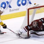 Arizona Coyotes goaltender Darcy Kuemper (35) makes a save on a shot by Nashville Predators center Colton Sissons (10) during the third period of an NHL hockey game Thursday, March 15, 2018, in Glendale, Ariz. The Predators defeated the Coyotes 3-2. (AP Photo/Ross D. Franklin)