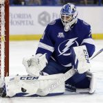 Tampa Bay Lightning goaltender Louis Domingue makes a pad save on a shot by the Arizona Coyotes during the first period of an NHL hockey game Monday, March 26, 2018, in Tampa, Fla. (AP Photo/Chris O'Meara)