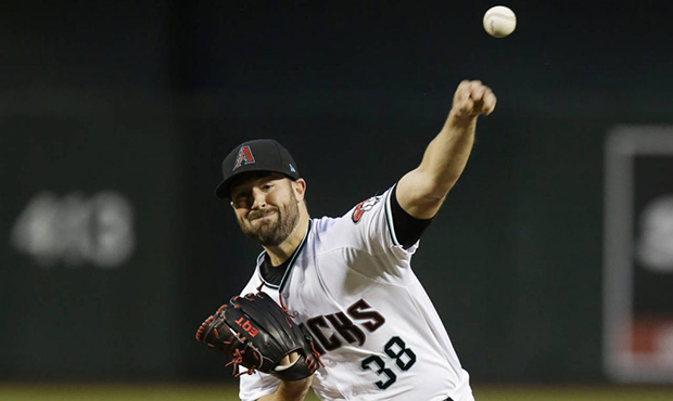 Arizona Diamondbacks starting pitcher Robbie Ray throws in the first inning during a baseball game ...