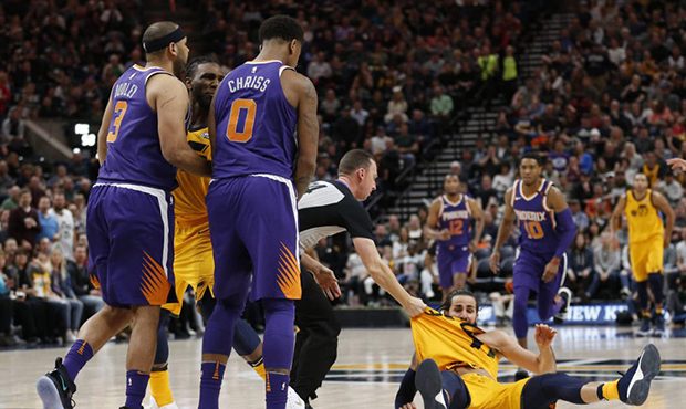 Phoenix Suns' Jared Dudley (3) and Marquese Chriss (0) stand nearby after shoving Utah Jazz's Ricky...