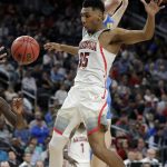 Arizona's Allonzo Trier (35) loses the ball on a drive against UCLA in overtime of an NCAA college basketball game in the semifinals of the Pac-12 men's tournament Friday, March 9, 2018, in Las Vegas. Arizona won 78-67. (AP Photo/Isaac Brekken)