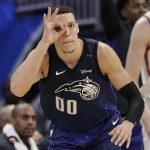 Orlando Magic's Aaron Gordon gestures after making a three-point basket against the Phoenix Suns in the fourth quarter of an NBA basketball game, Saturday, March 24, 2018, in Orlando, Fla. (AP Photo/John Raoux)