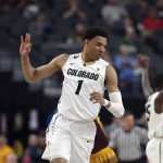 Colorado's Tyler Bey reacts after sinking a three-point shot during the second half of an NCAA college basketball game against Arizona State in the first round of the Pac-12 men's tournament Wednesday, March 7, 2018, in Las Vegas. (AP Photo/Isaac Brekken)