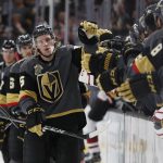 Vegas Golden Knights left wing Erik Haula celebrates after scoring against the Arizona Coyotes during the first period of an NHL hockey game, Wednesday, March 28, 2018, in Las Vegas. (AP Photo/John Locher)