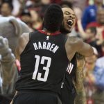Houston Rockets guard Gerald Green, right, celebrates with James Harden (13) after hitting a shot at the buzzer to beat the Phoenix Suns in an NBA basketball game Friday, March 30, 2018, in Houston. (AP Photo/George Bridges)