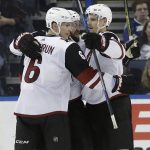 Arizona Coyotes defenseman Jakob Chychrun (6) celebrates his goal against the Tampa Bay Lightning with right wing Richard Panik during the second period of an NHL hockey game Monday, March 26, 2018, in Tampa, Fla. (AP Photo/Chris O'Meara)