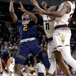 California guard Juhwan Harris-Dyson (2) shoots in front of Arizona State guard Shannon Evans II (11) during the first half of an NCAA college basketball game Thursday, March 1, 2018, in Tempe, Ariz. (AP Photo/Matt York)