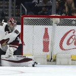Arizona Coyotes goalie Darcy Kuemper (35) watches the third goal of the game off Los Angeles Kings center Jeff Carter, not shown, during the third period of an NHL hockey game in Los Angeles Thursday, March 29, 2018. The Kings won 4-2. (AP Photo/Reed Saxon)