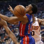 Detroit Pistons guard Ish Smith (14) loses the ball as Phoenix Suns forward Marquese Chriss (0) defends during the second half of an NBA basketball game Tuesday, March 20, 2018, in Phoenix. (AP Photo/Matt York)