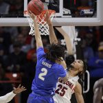 Buffalo guard Jeremy Harris (2) shoots against Arizona forward Keanu Pinder (25) during the first half of a first-round game in the NCAA men's college basketball tournament Thursday, March 15, 2018, in Boise, Idaho. (AP Photo/Ted S. Warren)