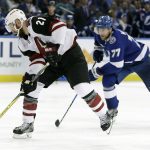 Arizona Coyotes center Derek Stepan (21) goes in for a breakaway against Tampa Bay Lightning goaltender Louis Domingue after getting around defenseman Victor Hedman (77) during the third period of an NHL hockey game Monday, March 26, 2018, in Tampa, Fla. (AP Photo/Chris O'Meara)