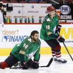 Arizona Coyotes left wing Jordan Martinook (48) and right wing Josh Archibald (45) wear St. Patrick's Day green jerseys during the pregame warmup prior to an NHL hockey game against the Minnesota Wild Saturday, March 17, 2018, in Glendale, Ariz. (AP Photo/Ross D. Franklin)