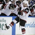 Arizona Coyotes defenseman Trevor Murphy (46) celebrates with the bench after scoring against the Tampa Bay Lightning during the second period of an NHL hockey game Monday, March 26, 2018, in Tampa, Fla. (AP Photo/Chris O'Meara)