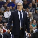 Phoenix Suns head coach Jay Triano shouts at an official during the first half of an NBA basketball game against the Boston Celtics, Monday, March 26, 2018, in Phoenix. (AP Photo/Ross D. Franklin)