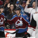 Colorado Avalanche left wing Blake Comeau, center, is congratulated by defenseman Tyson Barrie, back left, and center Carl Soderberg after scoring a goal against the Arizona Coyotes in the first period of an NHL hockey game Saturday, March 10, 2018, in Denver. (AP Photo/David Zalubowski)