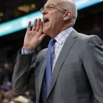 Phoenix Suns interim coach Jay Triano shouts to his team during the first half of an NBA basketball game against the Utah Jazz on Thursday, March 15, 2018, in Salt Lake City. (AP Photo/Rick Bowmer)