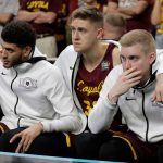 Loyola-Chicago players on the bench react during the second half in the semifinals of the Final Four NCAA college basketball tournament against Michigan, Saturday, March 31, 2018, in San Antonio. (AP Photo/Eric Gay)