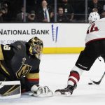 Arizona Coyotes right wing Richard Panik (14) scores against Vegas Golden Knights goaltender Marc-Andre Fleury during the first period of an NHL hockey game, Wednesday, March 28, 2018, in Las Vegas. (AP Photo/John Locher)