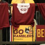 Shirts with the face of Sister Jean Dolores Schmidt hang from the railing during the March Madness watch party for the Loyola-Chicago vs. Michigan NCAA Final Four basketball game Saturday, March 31, 2018, in Chicago. (Erin Hooley/Chicago Tribune via AP)