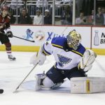 St. Louis Blues goaltender Jake Allen (34) cannot make the save against the Arizona Coyotes in the second period during an NHL hockey game, Saturday, March 31, 2018, in Glendale, Ariz. (AP Photo/Rick Scuteri)