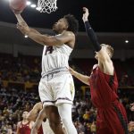 Arizona State forward Kimani Lawrence (14) scores past Stanford forward Michael Humphrey (10) during the second half of an NCAA college basketball game Saturday, March 3, 2018, in Tempe, Ariz. (AP Photo/Matt York)