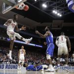Arizona forward Deandre Ayton (13) comes down after dunking against Buffalo during the first half of a first-round game in the NCAA men's college basketball tournament Thursday, March 15, 2018, in Boise, Idaho. (AP Photo/Ted S. Warren)