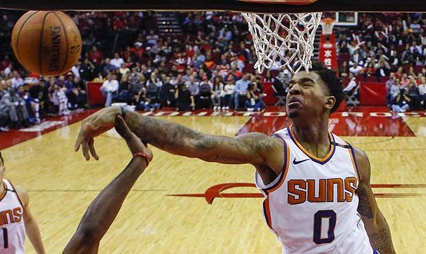 Phoenix Suns forward Marquese Chriss (0) blocks a shot by James Harden (13) during the second half ...