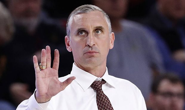 Arizona State head coach Bobby Hurley motions to his team during the second half of an NCAA college...