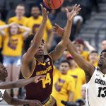 Arizona State's Kimani Lawrence (14), along with Colorado's McKinley Wright IV (25) and Namon Wright (13), reaches for a loose ball during the second half of an NCAA college basketball game in the first round of the Pac-12 men's tournament Wednesday, March 7, 2018, in Las Vegas. Colorado defeated Arizona State 97-85. (AP Photo/Isaac Brekken)