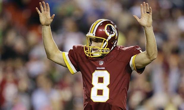 Washington Redskins quarterback Kirk Cousins (8) reacts to wide receiver Andre Roberts' touchdown d...