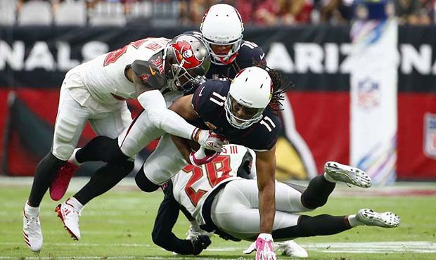 Arizona Cardinals wide receiver Larry Fitzgerald (11) gets tackled by Tampa Bay Buccaneers defensiv...