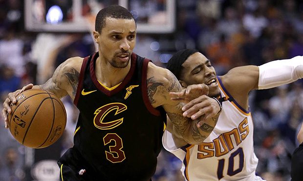 Cleveland Cavaliers guard George Hill (3) drives on Phoenix Suns guard Shaquille Harrison in the fi...