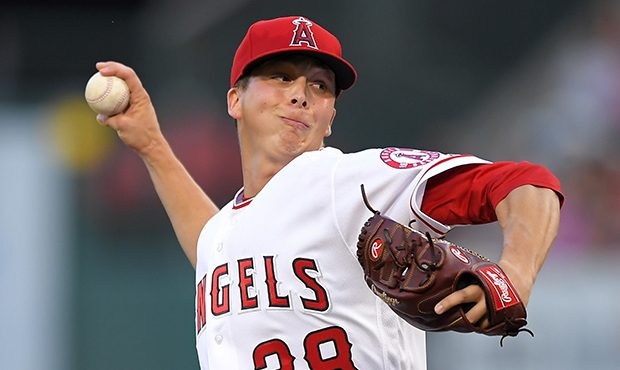 Los Angeles Angels starting pitcher Troy Scribner throws during the first inning of the team's base...