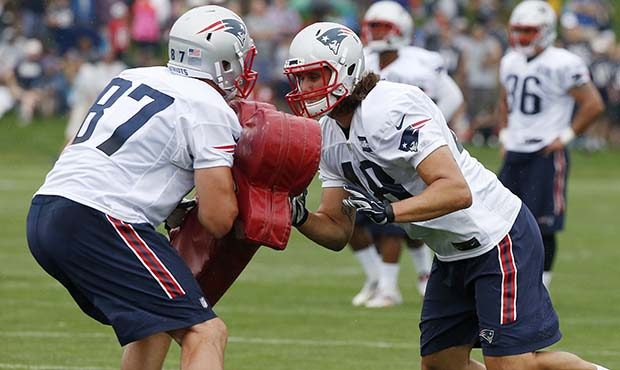 New England Patriots tight end Rob Gronkowski (87) and tight end Bryce Williams (48) run a drill du...