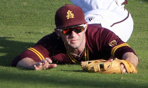 Arizona State outfielder Gage Canning tries but can't get to a ball hit by TCU in the second inning...
