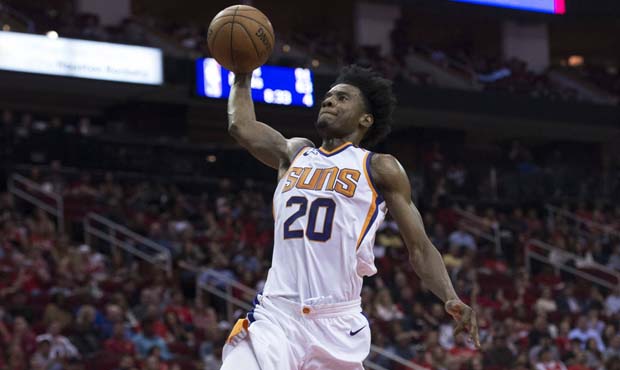 Phoenix Suns guard Josh Jackson (20) goes up for a dunk against the Houston Rockets in the second h...