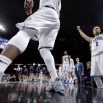Villanova's Jalen Brunson (1) and players on Villanova bench react during the second half in the championship game of the Final Four NCAA college basketball tournament against Michigan, Monday, April 2, 2018, in San Antonio. (AP Photo/David J. Phillip)