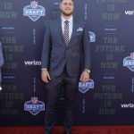 UCLA's Kolton Miller poses for photos on the red carpet before the first round of the NFL football draft, Thursday, April 26, 2018, in Arlington, Texas. (AP Photo/Eric Gay)