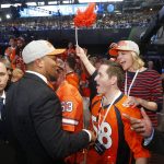North Carolina State's Bradley Chubb, center left, greets fans after being selected by the Denver Broncos during the first round of the NFL football draft, Thursday, April 26, 2018, in Arlington, Texas. (AP Photo/Michael Ainsworth)