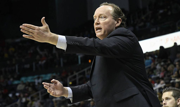 Atlanta Hawks head coach Mike Budenholzer wants a call from a referee call during the second half o...