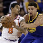 Phoenix Suns' Tyler Ulis (8) is defended by Golden State Warriors' Klay Thompson during the first half of an NBA basketball game Sunday, April 1, 2018, in Oakland, Calif. (AP Photo/Marcio Jose Sanchez)