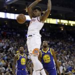 Phoenix Suns' Marquese Chriss dunks against the Golden State Warriors during the second half of an NBA basketball game Sunday, April 1, 2018, in Oakland, Calif. (AP Photo/Marcio Jose Sanchez)