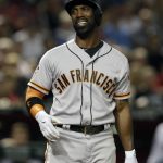 San Francisco Giants center fielder Andrew McCutchen reacts after striking out against the Arizona Diamondbacks in the seventh inning during a baseball game, Tuesday, April 17, 2018, in Phoenix. (AP Photo/Rick Scuteri)