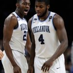Villanova forward Dhamir Cosby-Roundtree, left, reacts with teammate Eric Paschall during the second half against Michigan in the championship game of the Final Four NCAA college basketball tournament, Monday, April 2, 2018, in San Antonio. (AP Photo/David J. Phillip)