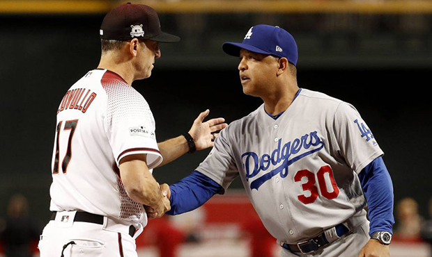 Los Angeles Dodgers manager Dave Roberts (30) greets Arizona Diamondbacks manager Torey Lovullo (17...